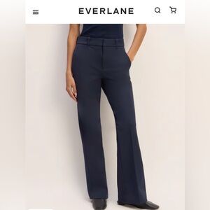 Never worn (except to try on) Everlane navy bi-stretch flare pant in size 6.